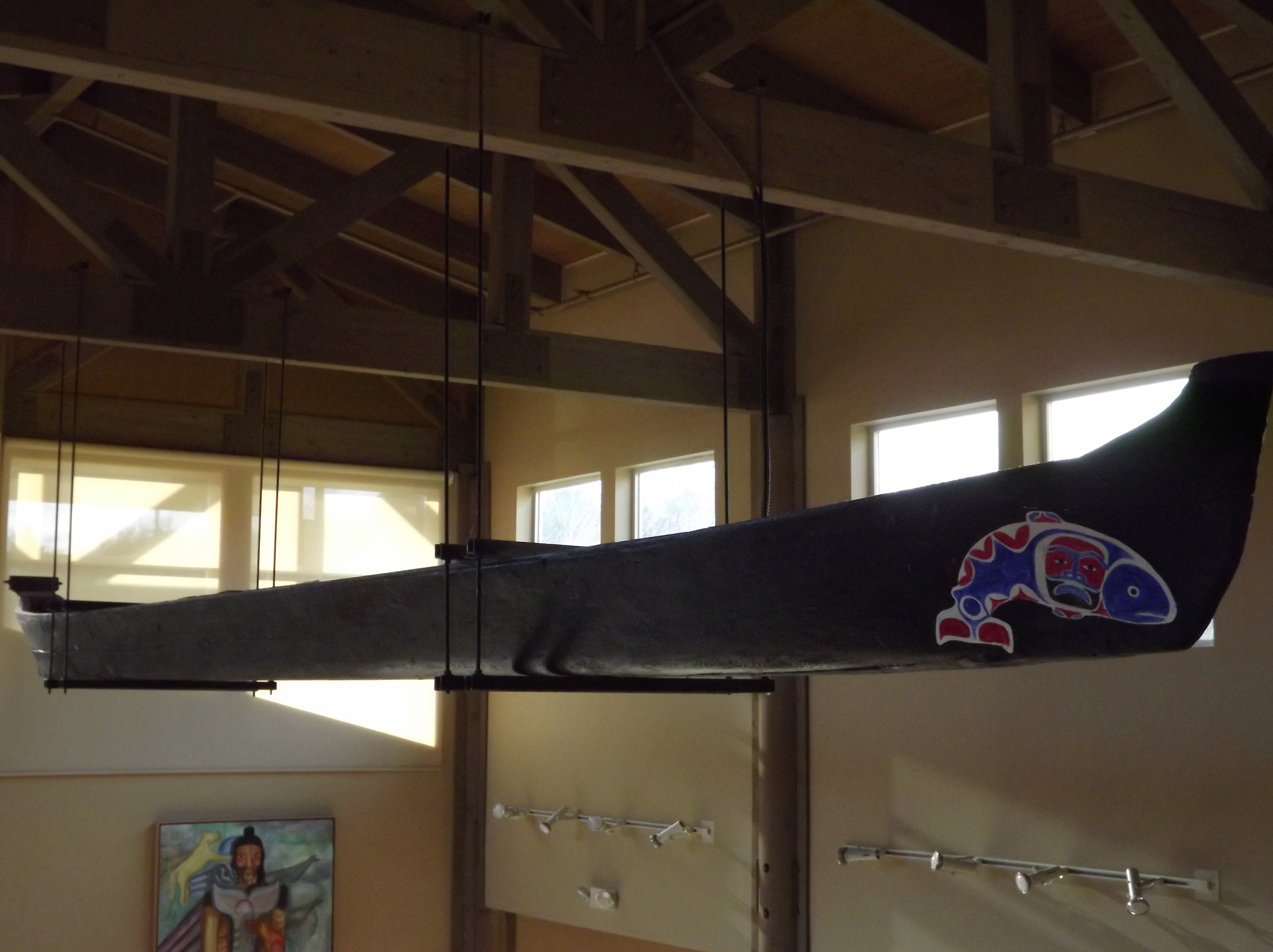 Photo of tribal canoe hanging in a building